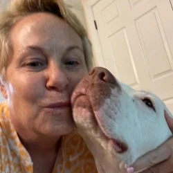 2740eeea-1825-11ee-9c58-0e0a1190afc9 Chad Singer Hallie Hill Animal Sanctuary Laps for Love 2022